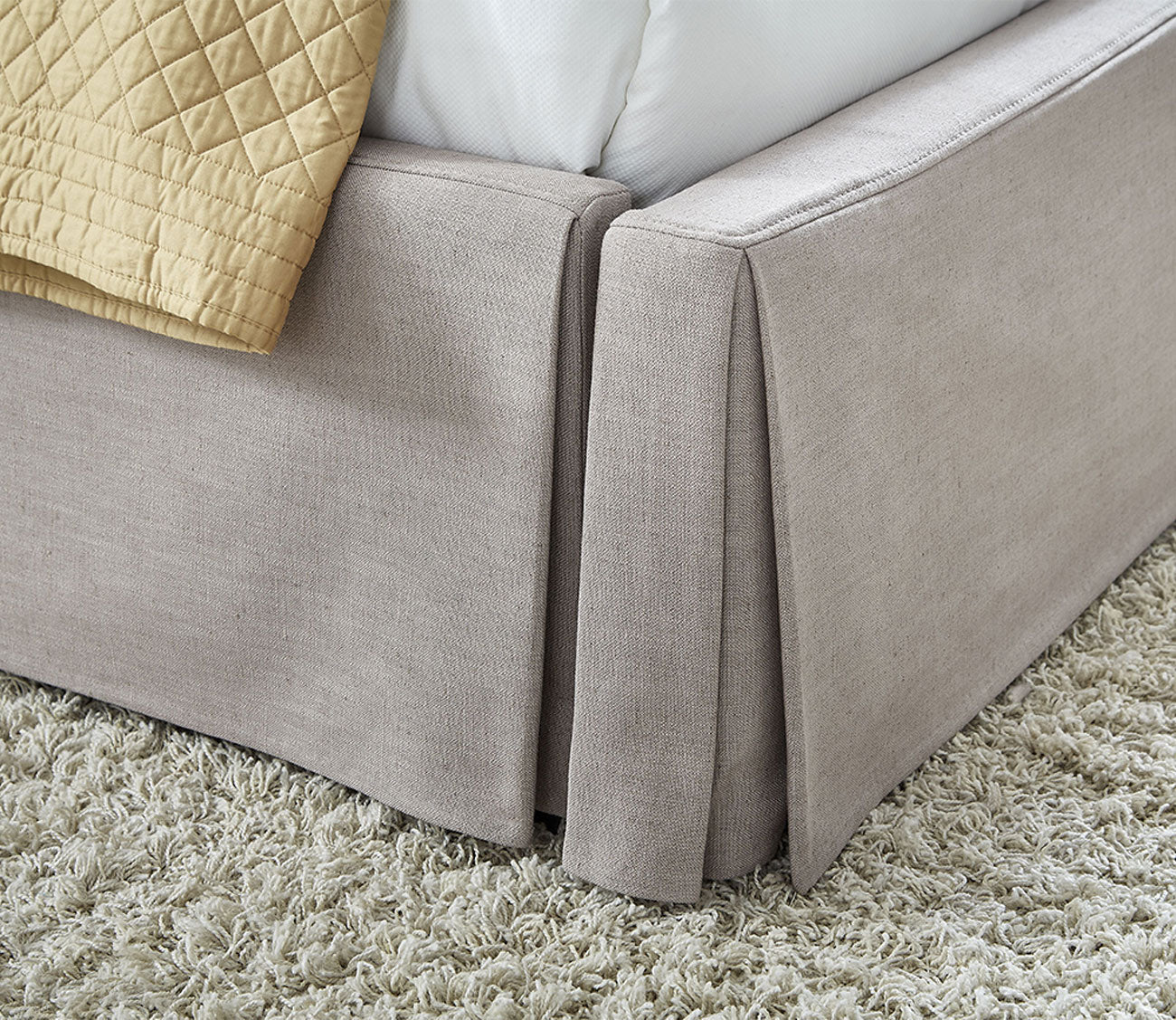 Modus Furniture Laurel Upholstered Skirted Storage Panel Bed